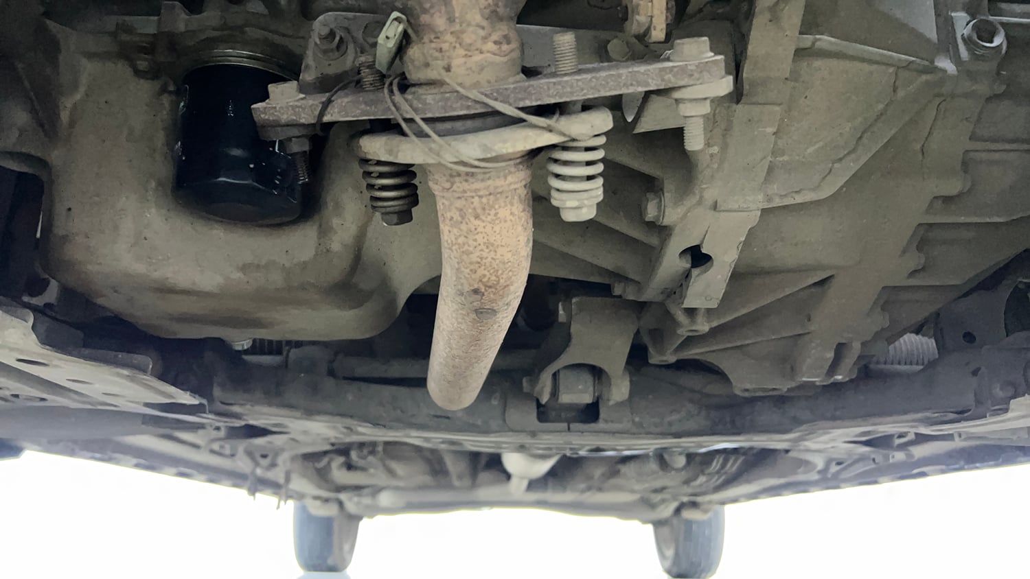Used 2023 Maruti Suzuki XL6 Alpha Plus MT Petrol Petrol Manual extra FRONT LEFT UNDERBODY VIEW