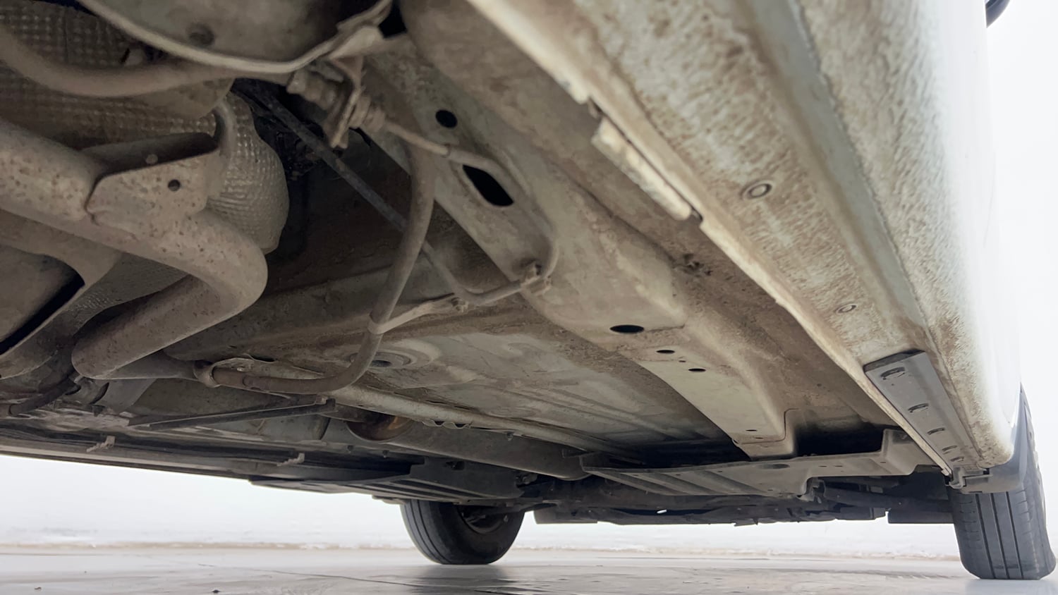 Used 2025 Maruti Suzuki Dzire VXi CNG Cng Manual extra REAR RIGHT UNDERBODY VIEW