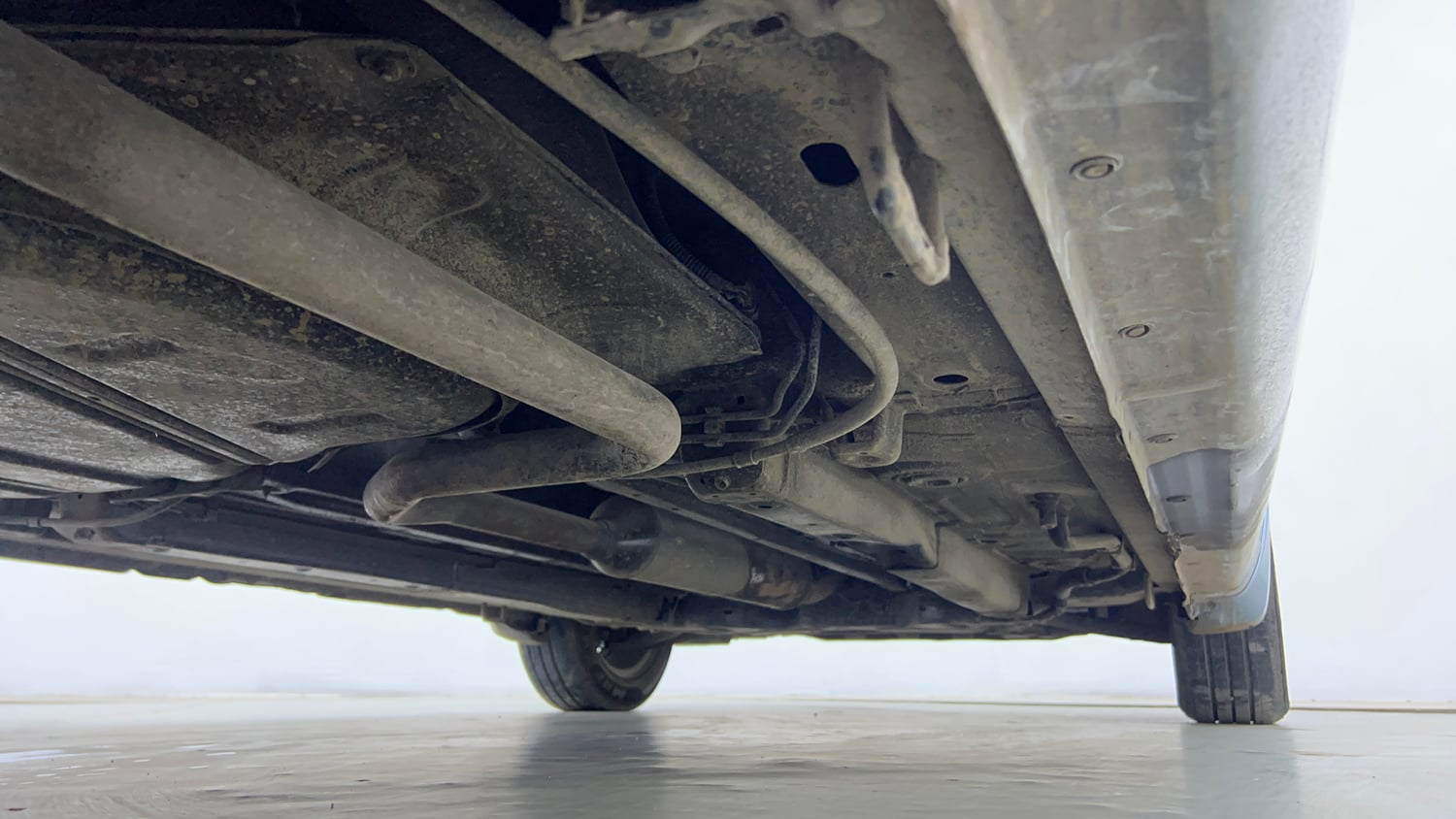 Used 2013 Maruti Suzuki Ertiga Vxi Petrol Manual extra REAR RIGHT UNDERBODY VIEW