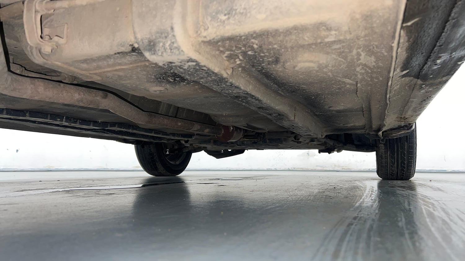 Used 2015 Hyundai Grand i10 Sportz 1.2 Kappa VTVT Petrol Manual extra REAR RIGHT UNDERBODY VIEW