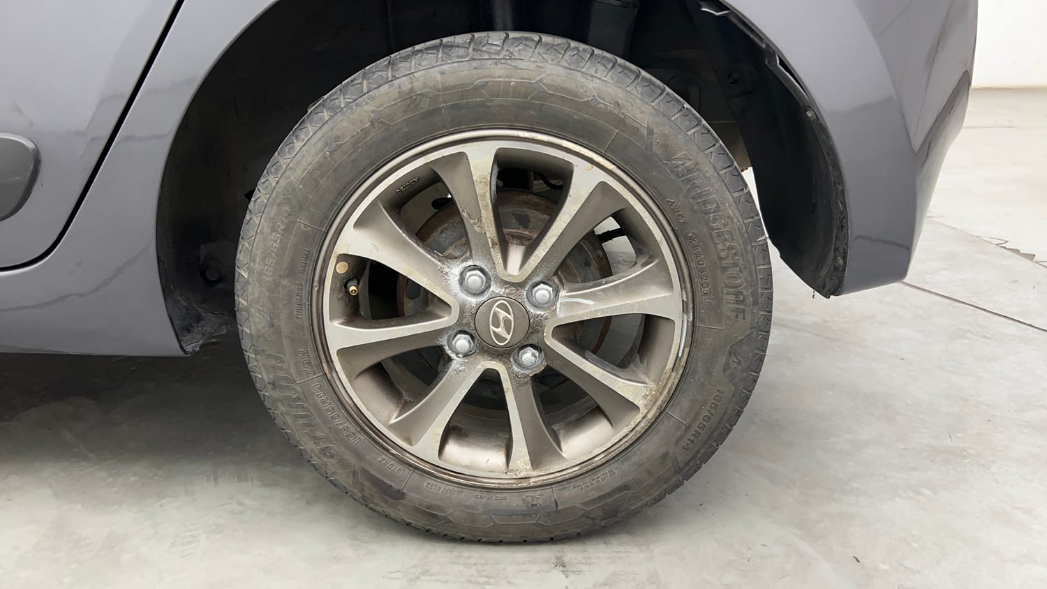 Used 2013 Hyundai Grand i10 Asta 1.2 Kappa VTVT Petrol Manual tyres LEFT REAR TYRE RIM VIEW