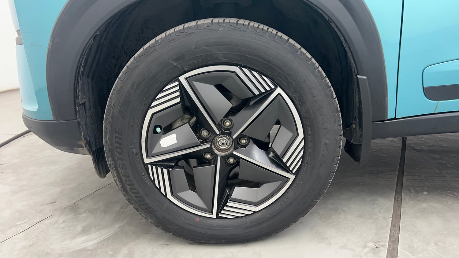 Used 2024 Tata Nexon Creative Plus 1.2 Revotron Petrol 7DCA Petrol Automatic tyres LEFT FRONT TYRE RIM VIEW