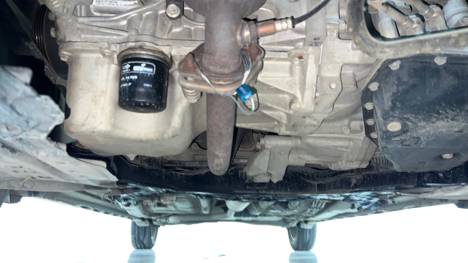 Used 2019 Maruti Suzuki XL6 Alpha AT Petrol Petrol Automatic extra FRONT LEFT UNDERBODY VIEW