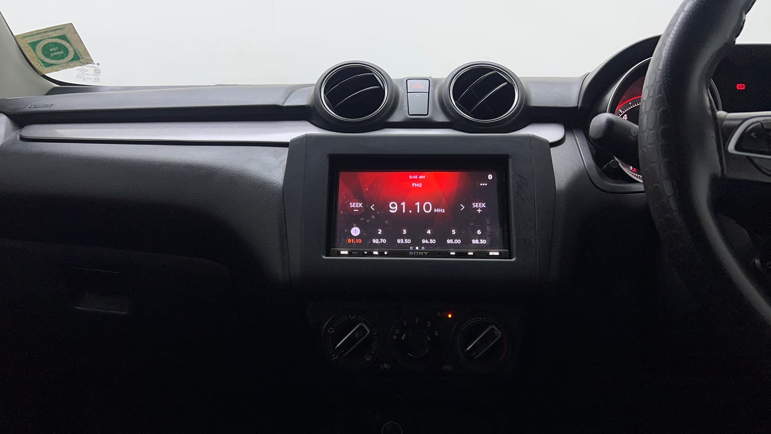 Used 2021 Maruti Suzuki Swift VXi Petrol Manual interior MUSIC SYSTEM & AC CONTROL VIEW