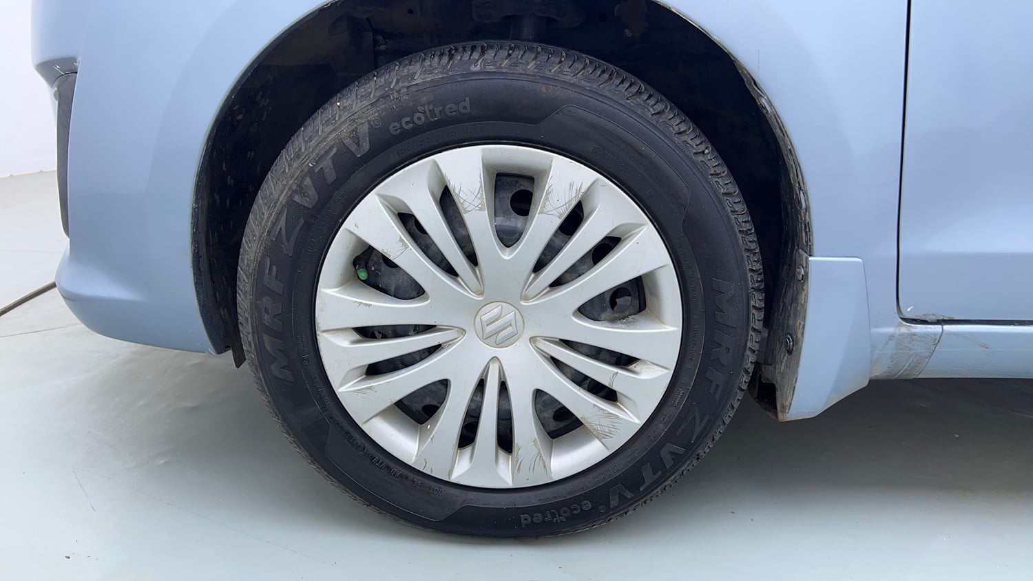 Used 2013 Maruti Suzuki Ertiga Vxi Petrol Manual tyres LEFT FRONT TYRE RIM VIEW