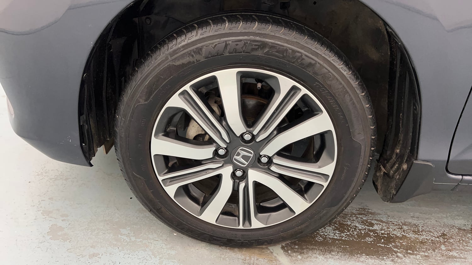 Used 2024 honda Amaze 2nd Generation VX 1.2 Petrol MT Petrol Manual tyres LEFT FRONT TYRE RIM VIEW