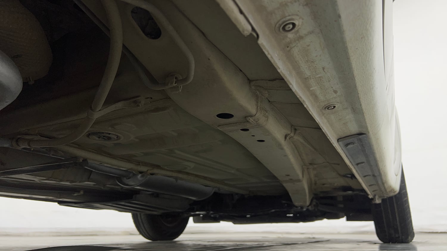 Used 2022 Maruti Suzuki Swift LXi Petrol Manual extra REAR RIGHT UNDERBODY VIEW