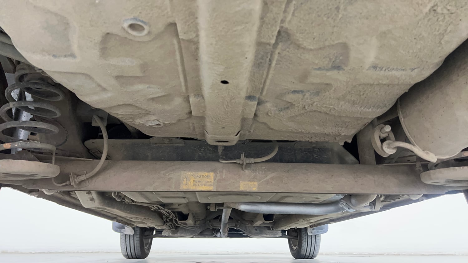 Used 2014 Tata Zest XMS Petrol Petrol Manual extra REAR UNDERBODY VIEW (TAKEN FROM REAR)