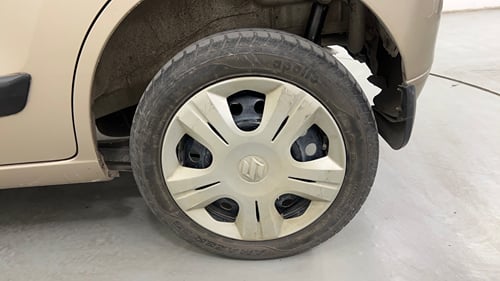 Used 2013 Maruti Suzuki Wagon R VXI Petrol Manual tyres LEFT REAR TYRE RIM VIEW