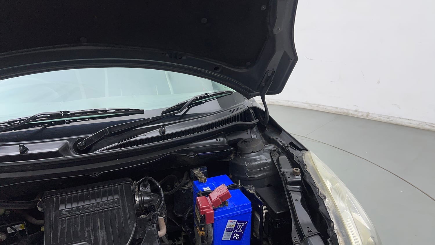 Used 2015 Maruti Suzuki Swift VXi Petrol Manual engine ENGINE LEFT SIDE HINGE & APRON VIEW