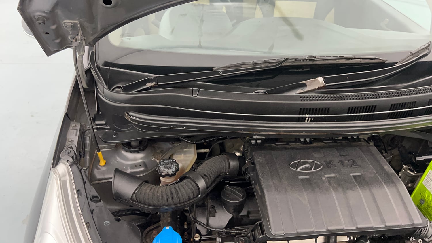 Used 2015 Hyundai Grand i10 Sportz 1.2 Kappa VTVT Petrol Manual engine ENGINE RIGHT SIDE HINGE & APRON VIEW