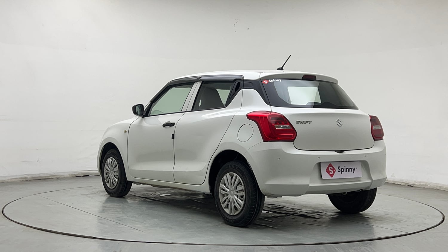 Used 2022 Maruti Suzuki Swift LXi Petrol Manual exterior LEFT REAR CORNER VIEW