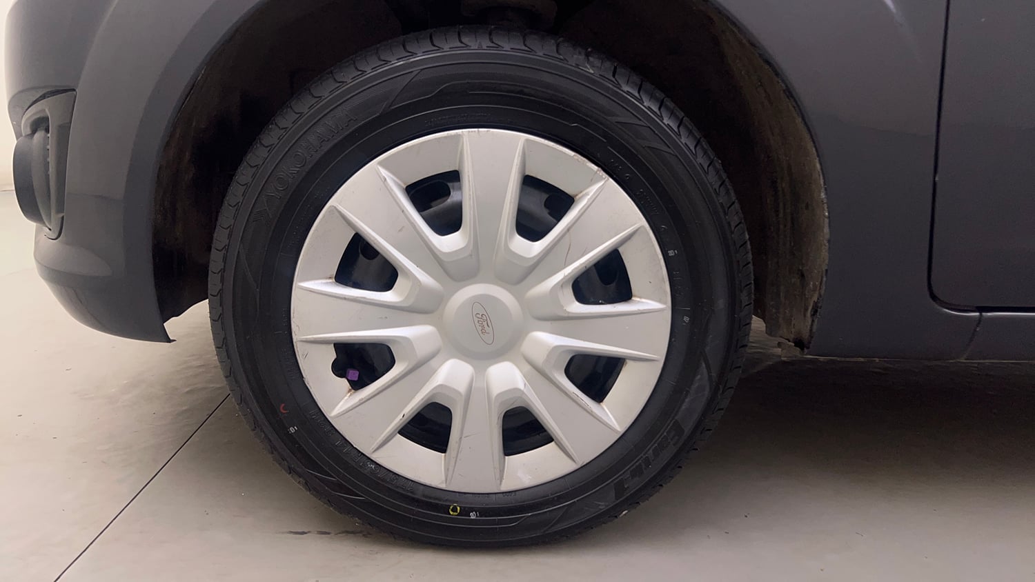 Used 2013 Ford Figo Duratorq Diesel ZXI 1.4 Diesel Manual tyres LEFT FRONT TYRE RIM VIEW