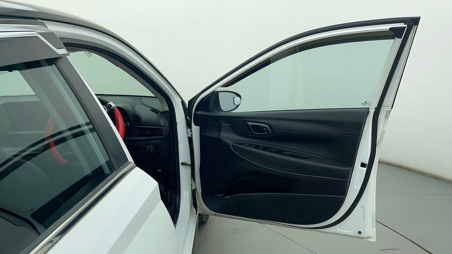 Used 2023 Hyundai i20 Sportz 1.2 MT Dual Tone Petrol Manual interior RIGHT FRONT DOOR OPEN VIEW