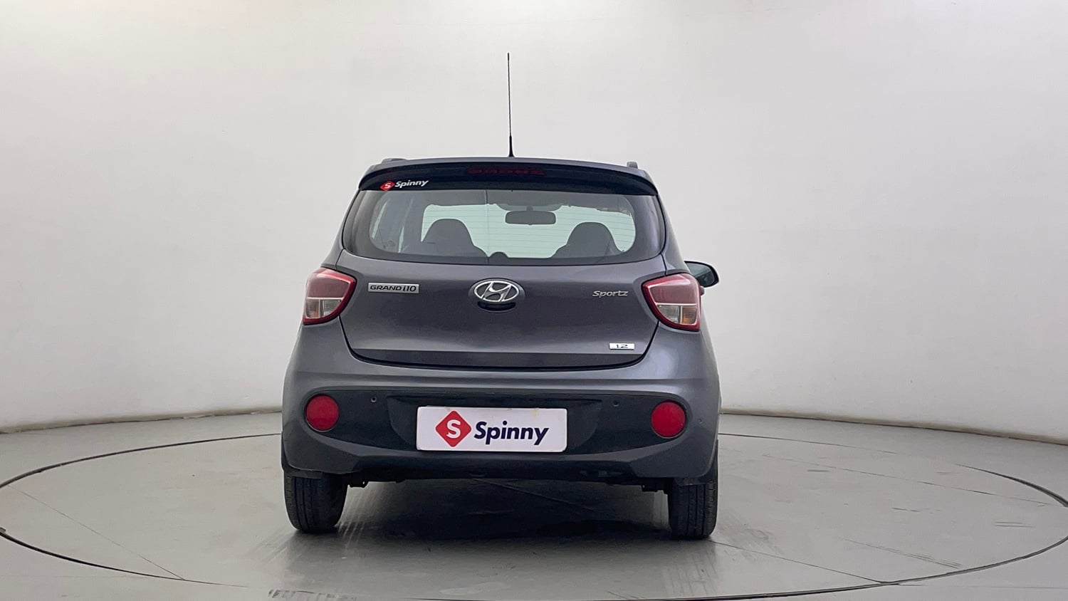 Used 2019 Hyundai Grand i10 Sportz 1.2 Kappa VTVT Petrol Manual exterior BACK VIEW