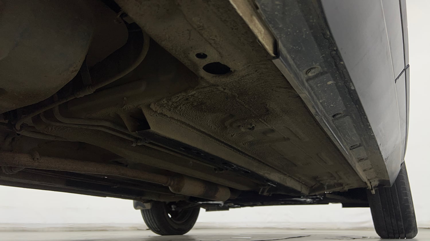 Used 2023 Nissan Magnite XE Petrol Manual extra REAR RIGHT UNDERBODY VIEW