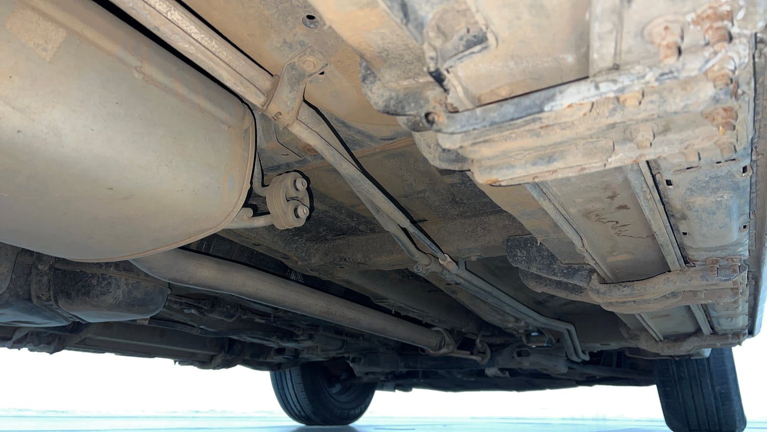 Used 2022 Mahindra XUV700 AX 5 Petrol MT 7 STR Petrol Manual extra REAR RIGHT UNDERBODY VIEW