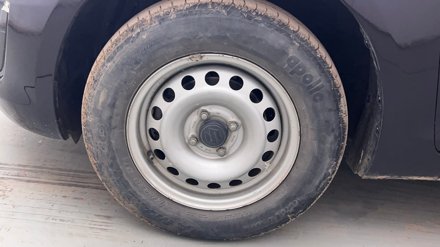 Used 2015 Maruti Suzuki Swift LXi Petrol Manual tyres LEFT FRONT TYRE RIM VIEW
