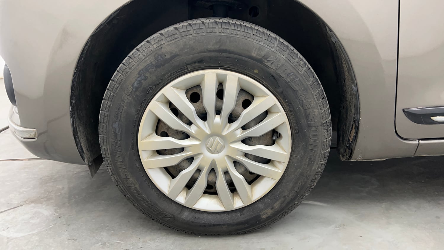 Used 2020 Maruti Suzuki Dzire VXi AMT Petrol Automatic tyres LEFT FRONT TYRE RIM VIEW
