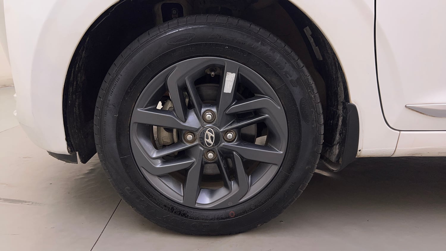 Used 2022 Hyundai Grand i10 Nios Sportz 1.2 Kappa VTVT Petrol Manual tyres LEFT FRONT TYRE RIM VIEW