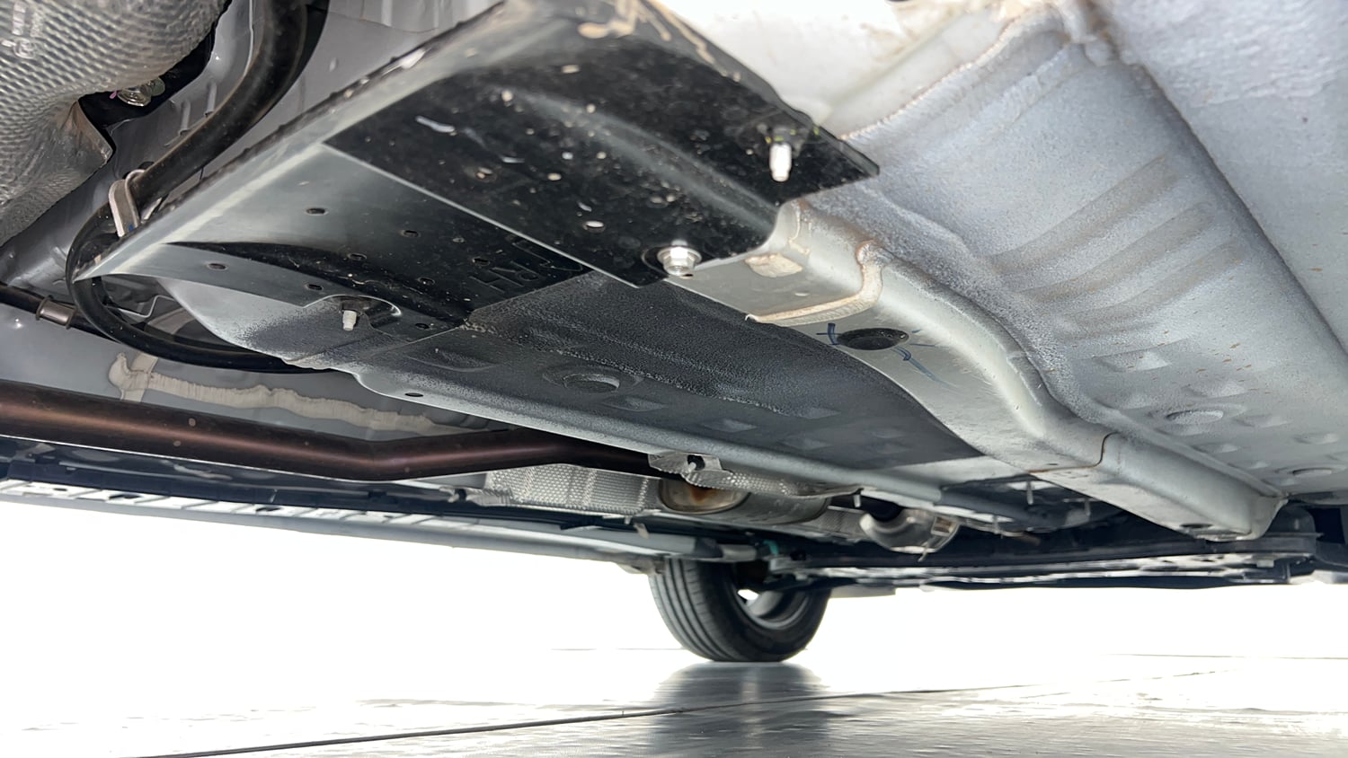 Used 2025 Hyundai New i20 Asta (O) 1.2 MT Petrol Manual extra REAR RIGHT UNDERBODY VIEW
