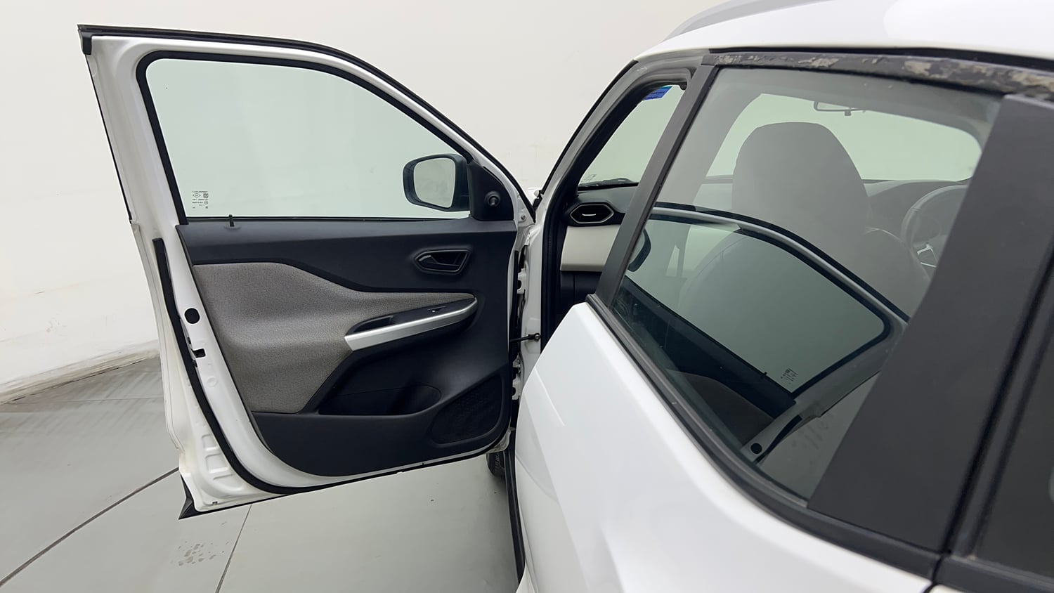 Used 2023 Nissan Magnite XE Petrol Manual interior LEFT FRONT DOOR OPEN VIEW