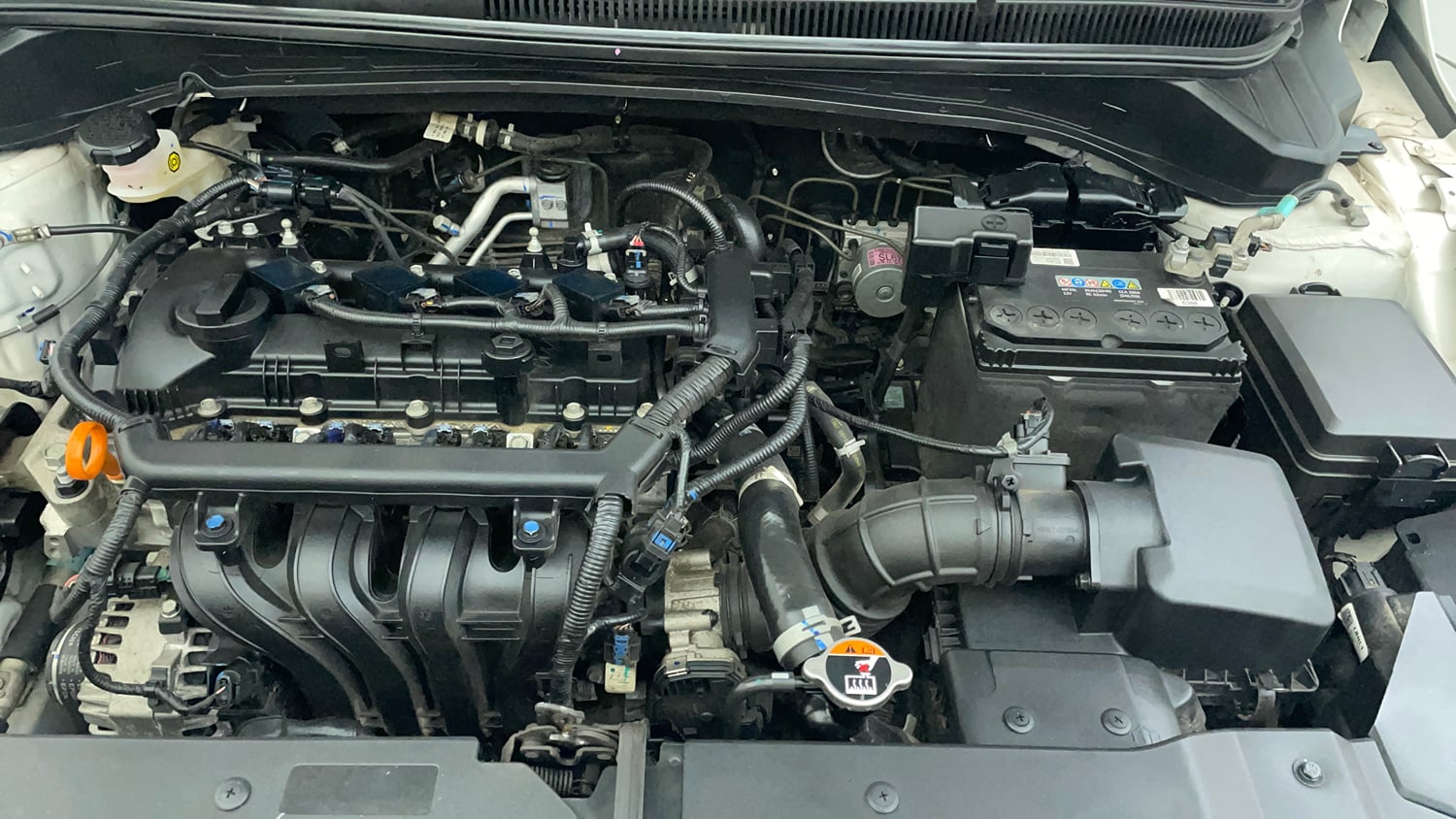 Used 2023 Hyundai i20 Sportz 1.2 MT Dual Tone Petrol Manual engine ENGINE LEFT SIDE VIEW