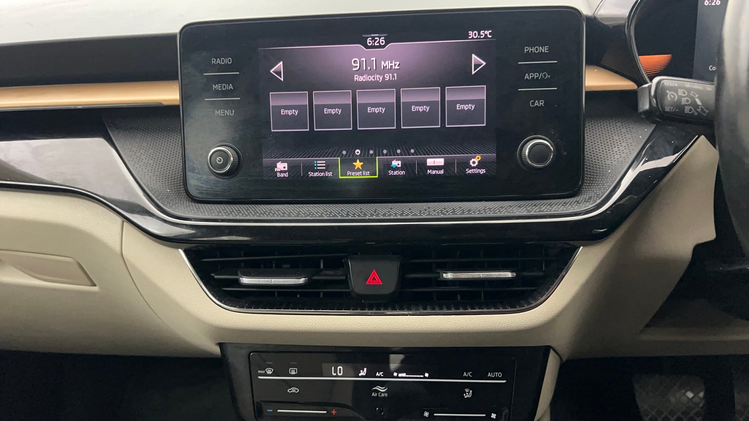 Used 2022 Skoda Slavia Style 1.0L TSI AT Petrol Automatic interior MUSIC SYSTEM & AC CONTROL VIEW