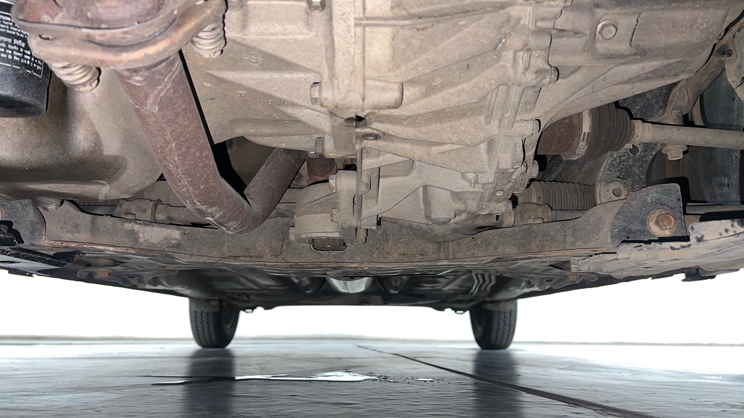 Used 2020 Maruti Suzuki Dzire VXi AMT Petrol Automatic extra FRONT LEFT UNDERBODY VIEW