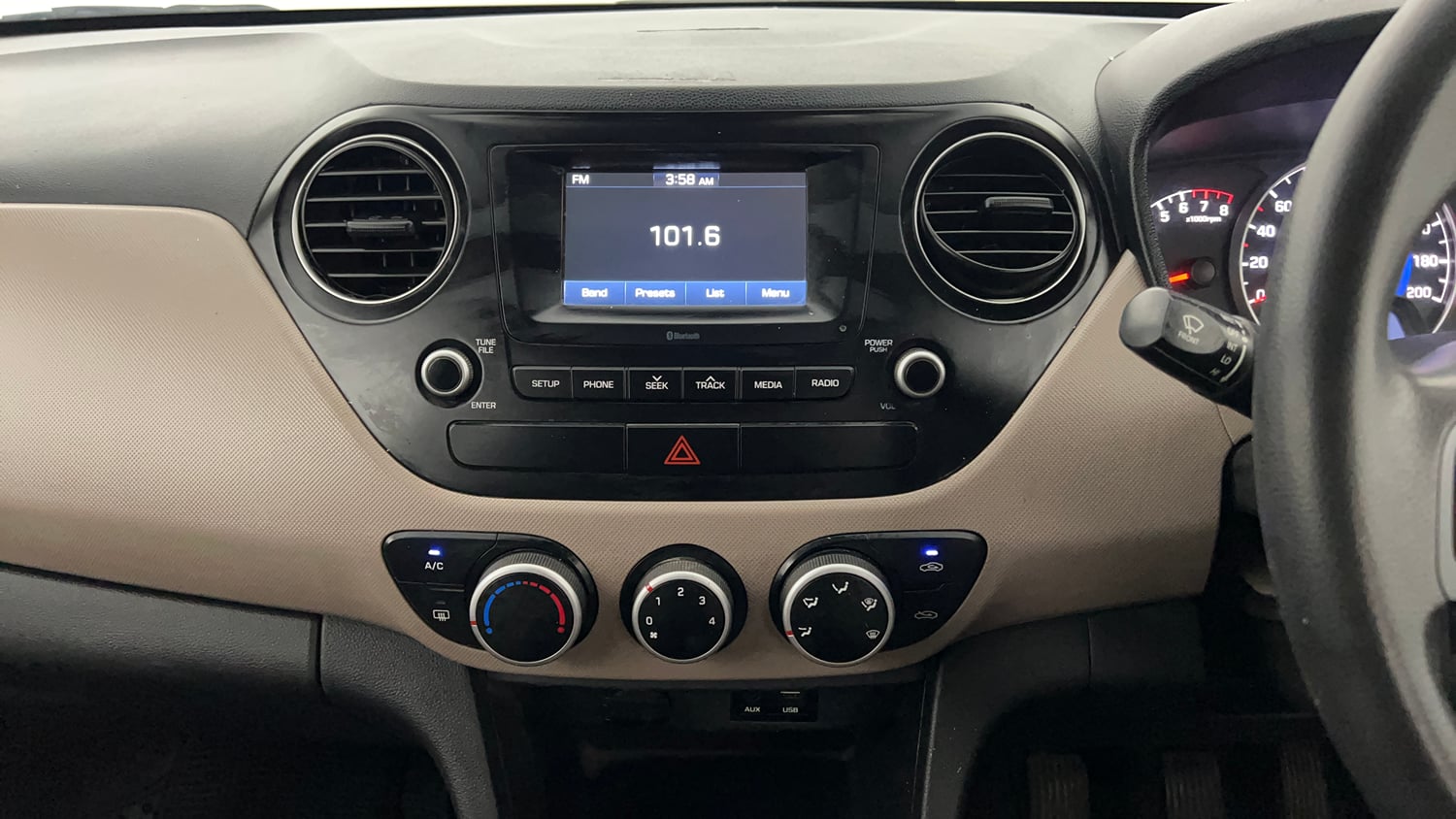 Used 2018 Hyundai Grand i10 Sportz 1.2 Kappa VTVT Petrol Manual interior MUSIC SYSTEM & AC CONTROL VIEW