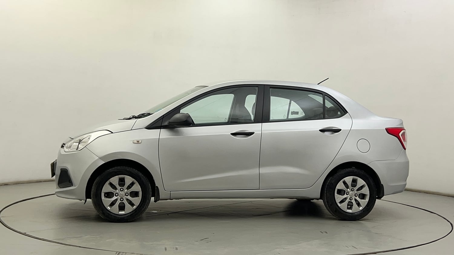 Used 2014 Hyundai Xcent Base 1.2 Petrol Manual exterior LEFT SIDE VIEW