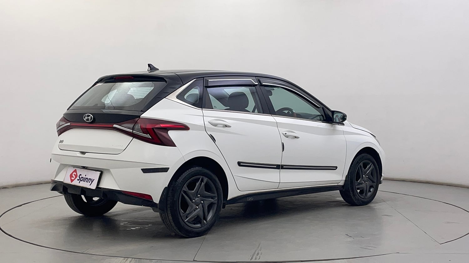 Used 2023 Hyundai i20 Sportz 1.2 MT Dual Tone Petrol Manual exterior RIGHT REAR CORNER VIEW
