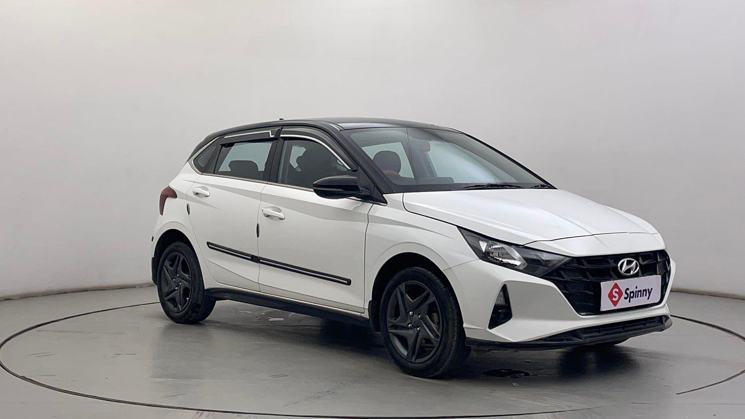 Used 2023 Hyundai i20 Sportz 1.2 MT Dual Tone Petrol Manual exterior RIGHT FRONT CORNER VIEW