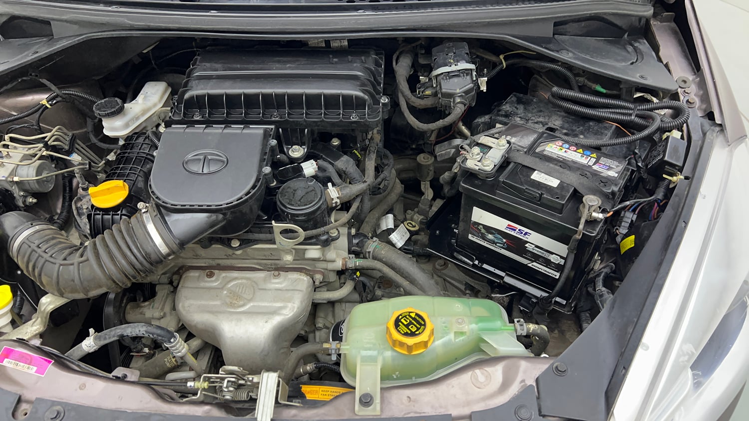 Used 2019 Tata Tiago Revotron XE Petrol Manual engine ENGINE LEFT SIDE VIEW