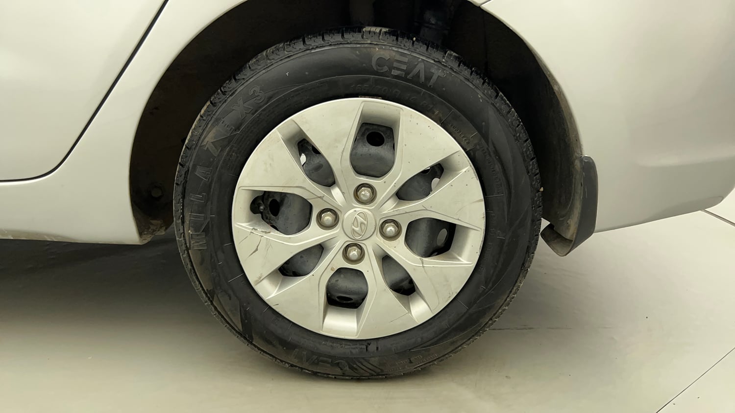 Used 2014 Hyundai Xcent Base 1.2 Petrol Manual tyres LEFT REAR TYRE RIM VIEW