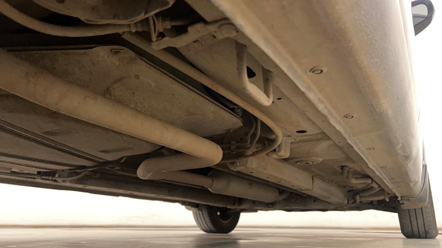 Used 2013 Maruti Suzuki Ertiga Vxi Petrol Manual extra REAR RIGHT UNDERBODY VIEW