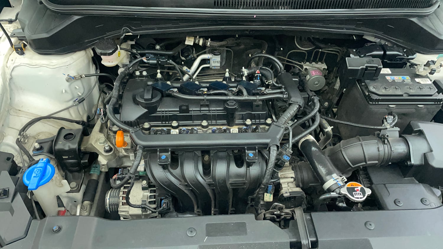 Used 2023 Hyundai i20 Sportz 1.2 MT Dual Tone Petrol Manual engine ENGINE RIGHT SIDE VIEW