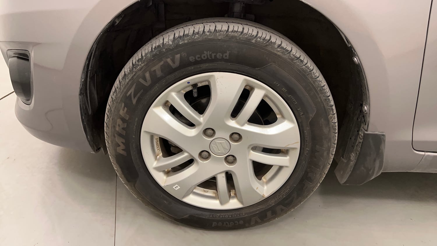 Used 2013 Maruti Suzuki Swift Dzire ZXI Petrol Manual tyres LEFT FRONT TYRE RIM VIEW