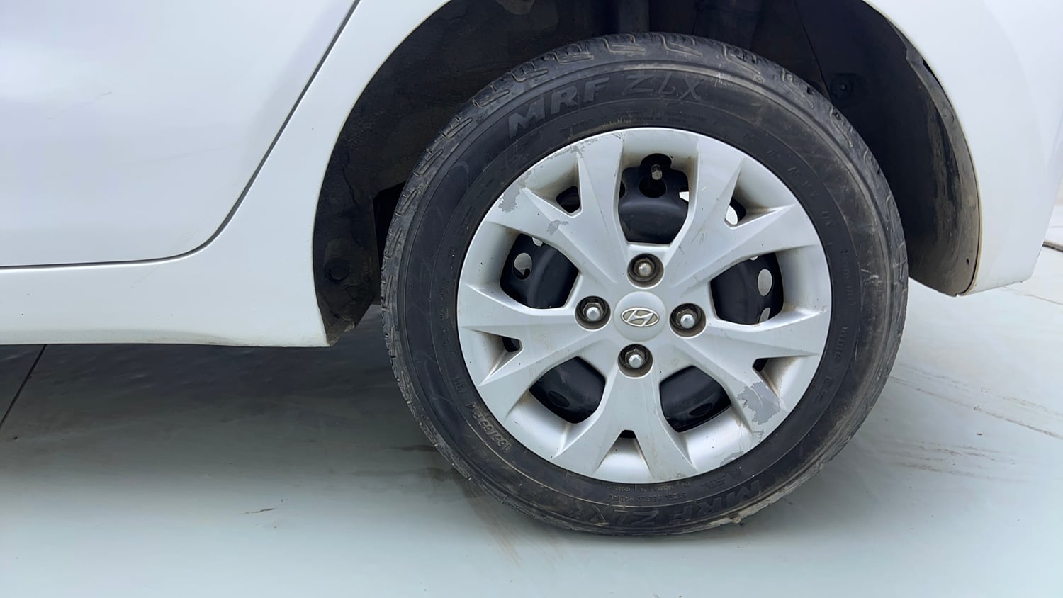 Used 2013 Hyundai Grand i10 Magna 1.2 Kappa VTVT Petrol Manual tyres LEFT REAR TYRE RIM VIEW