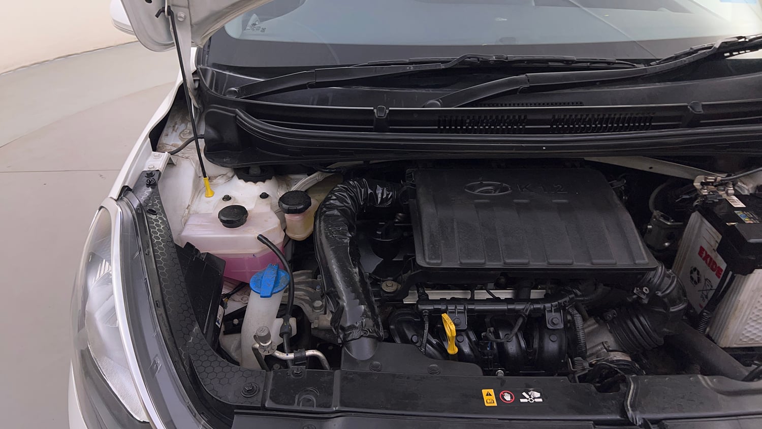 Used 2022 Hyundai Grand i10 Nios Sportz 1.2 Kappa VTVT Petrol Manual engine ENGINE RIGHT SIDE HINGE & APRON VIEW