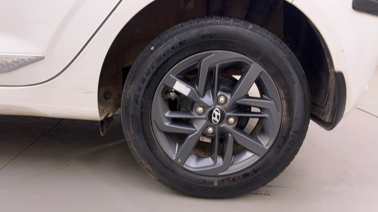 Used 2022 Hyundai Grand i10 Nios Sportz 1.2 Kappa VTVT Petrol Manual tyres LEFT REAR TYRE RIM VIEW