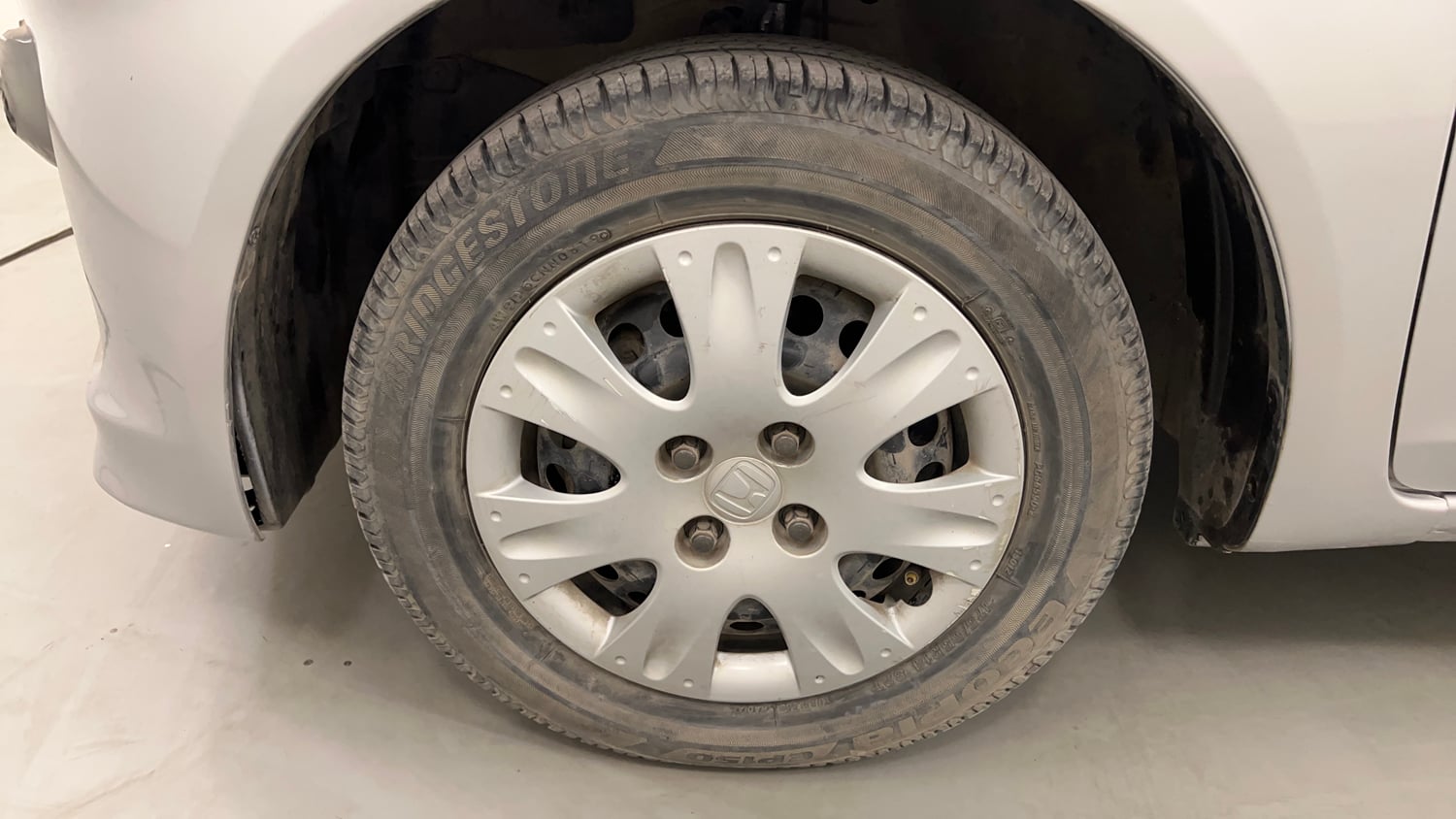 Used 2014 Honda Brio S MT Petrol Manual tyres LEFT FRONT TYRE RIM VIEW