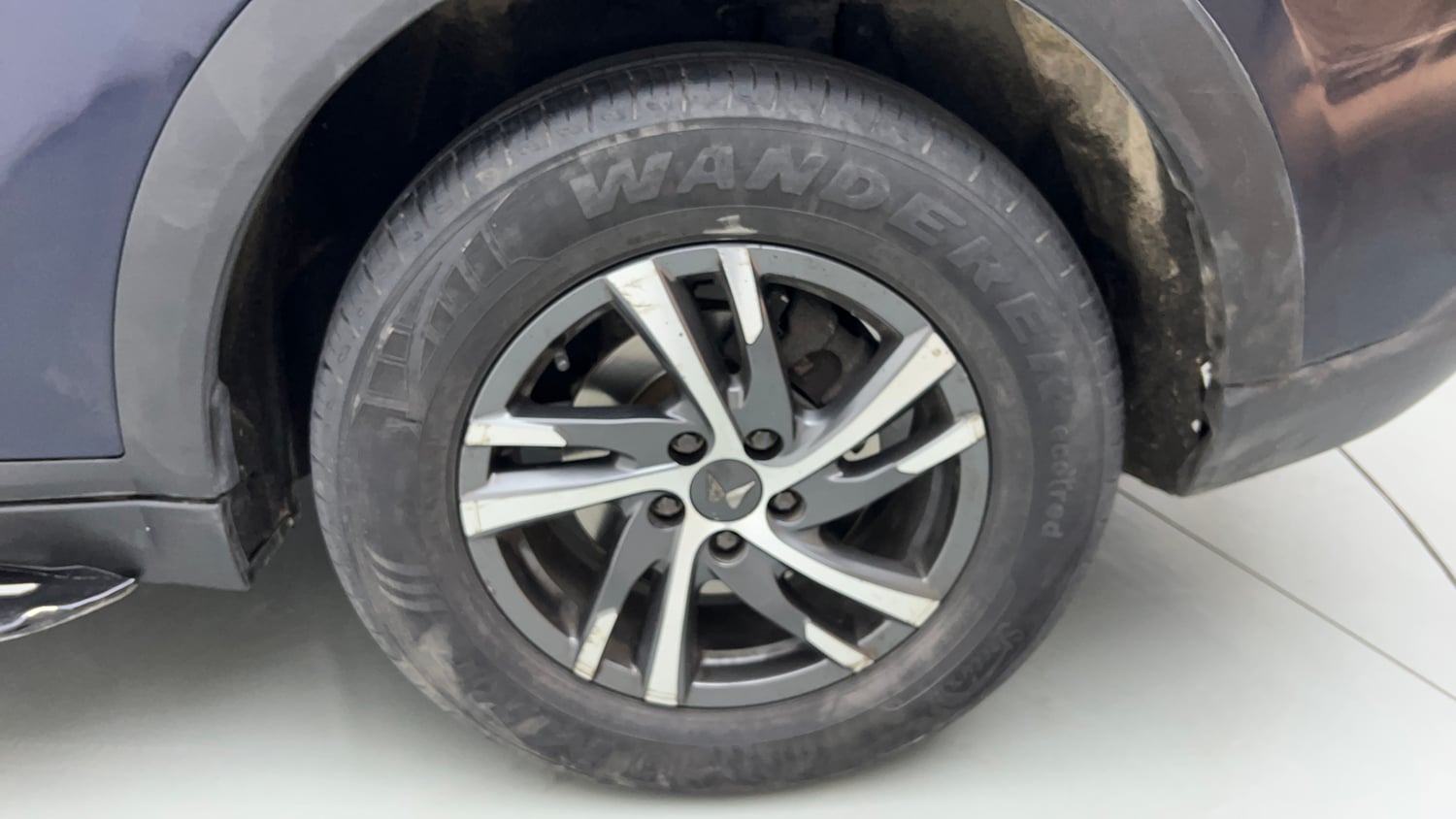 Used 2022 Mahindra XUV700 AX 5 Petrol MT 7 STR Petrol Manual tyres LEFT REAR TYRE RIM VIEW