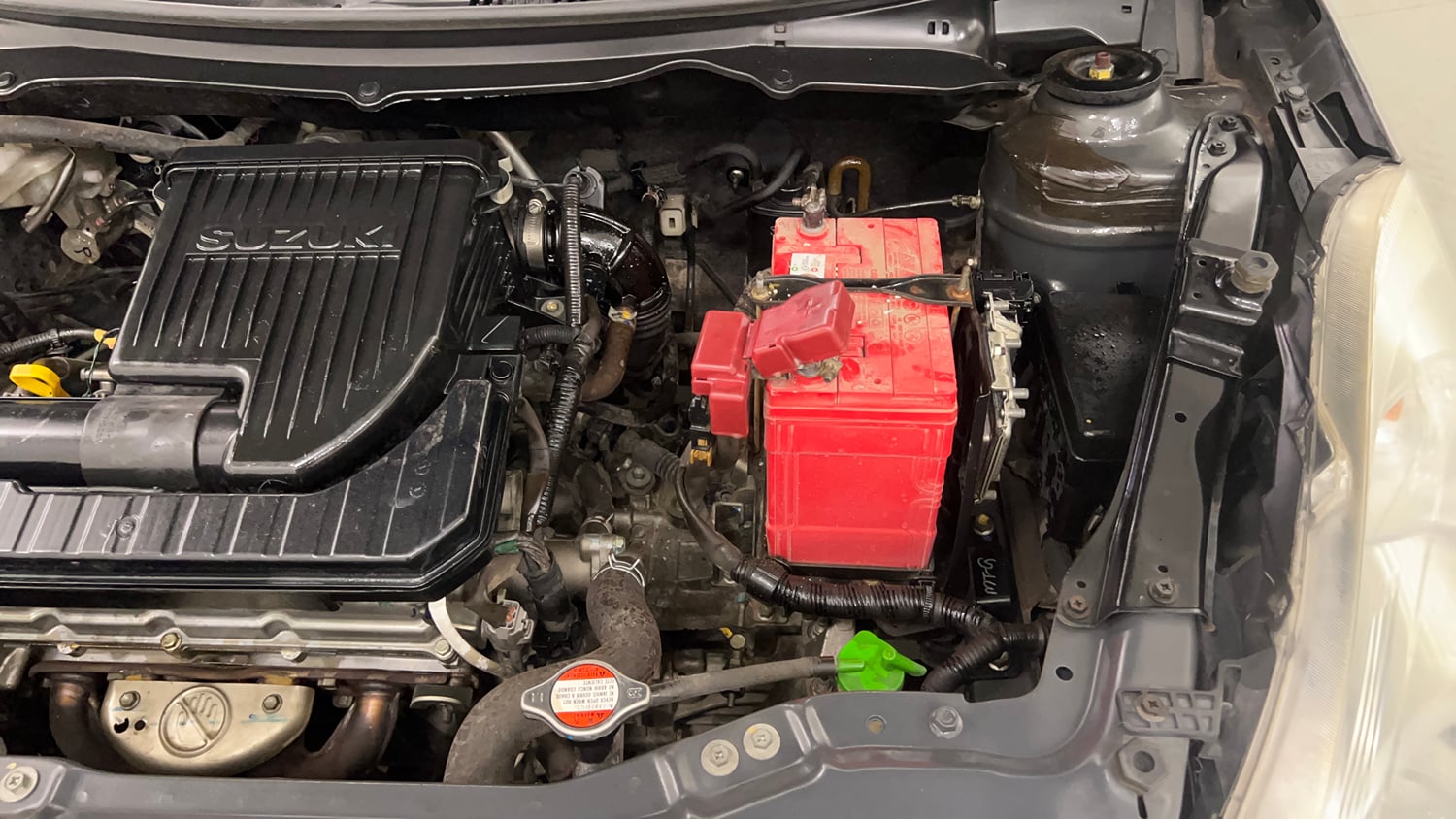 Used 2013 Maruti Suzuki Swift Dzire ZXI Petrol Manual engine ENGINE LEFT SIDE VIEW