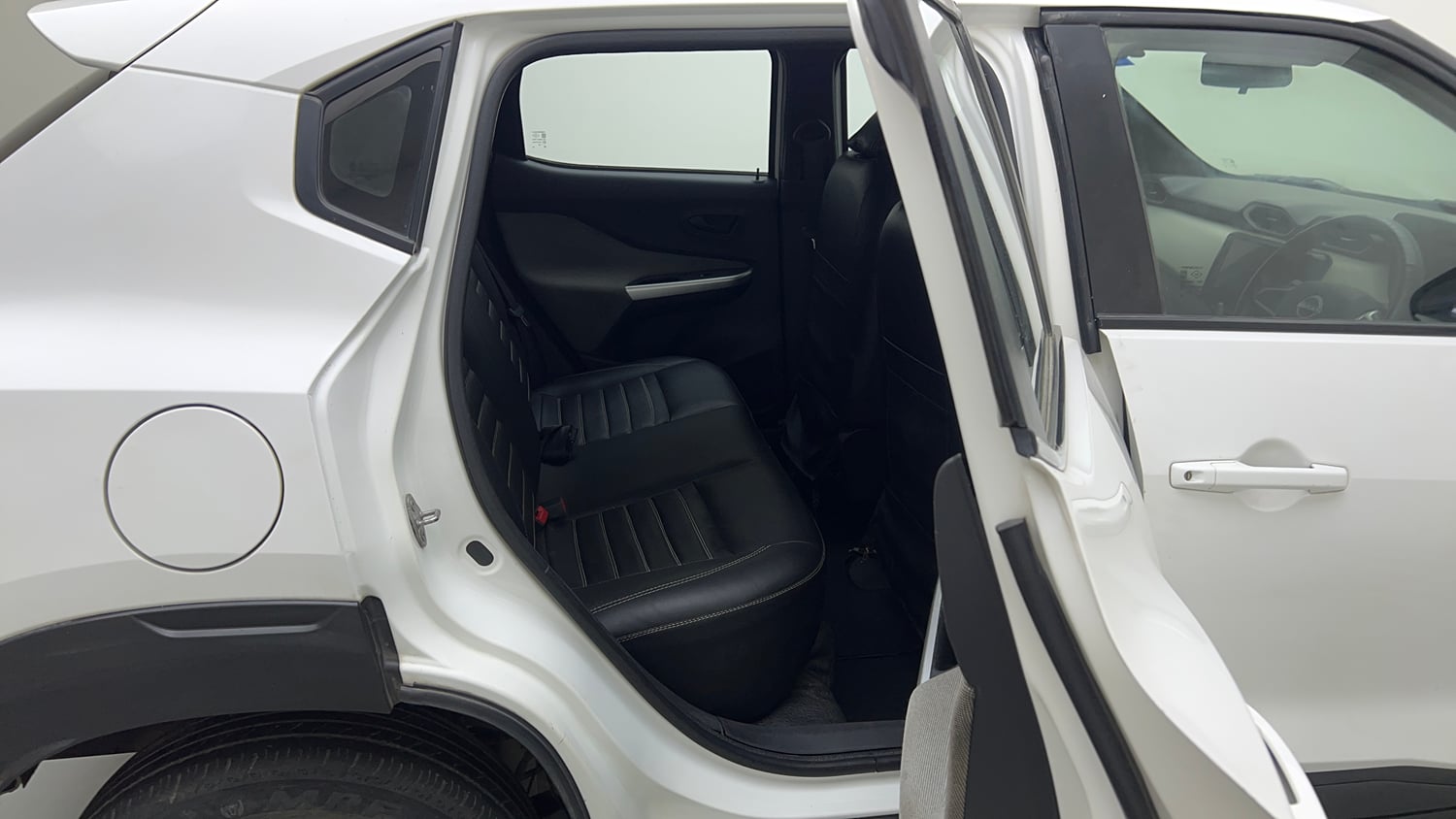 Used 2023 Nissan Magnite XE Petrol Manual interior RIGHT SIDE REAR DOOR CABIN VIEW