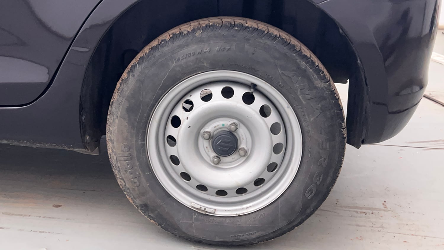 Used 2015 Maruti Suzuki Swift LXi Petrol Manual tyres LEFT REAR TYRE RIM VIEW