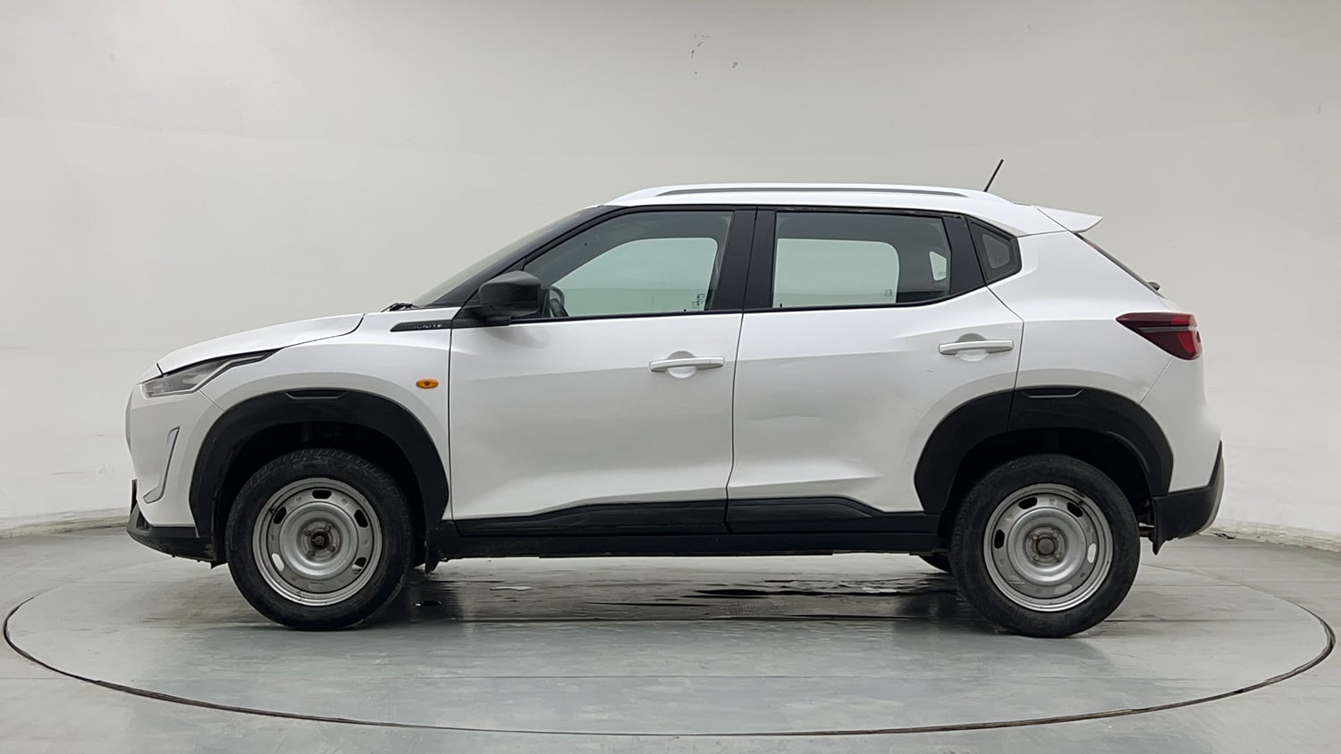 Used 2023 Nissan Magnite XE Petrol Manual exterior LEFT SIDE VIEW