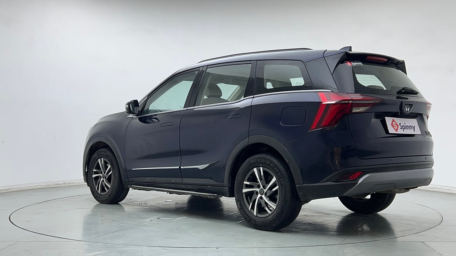 Used 2022 Mahindra XUV700 AX 5 Petrol MT 7 STR Petrol Manual exterior LEFT REAR CORNER VIEW