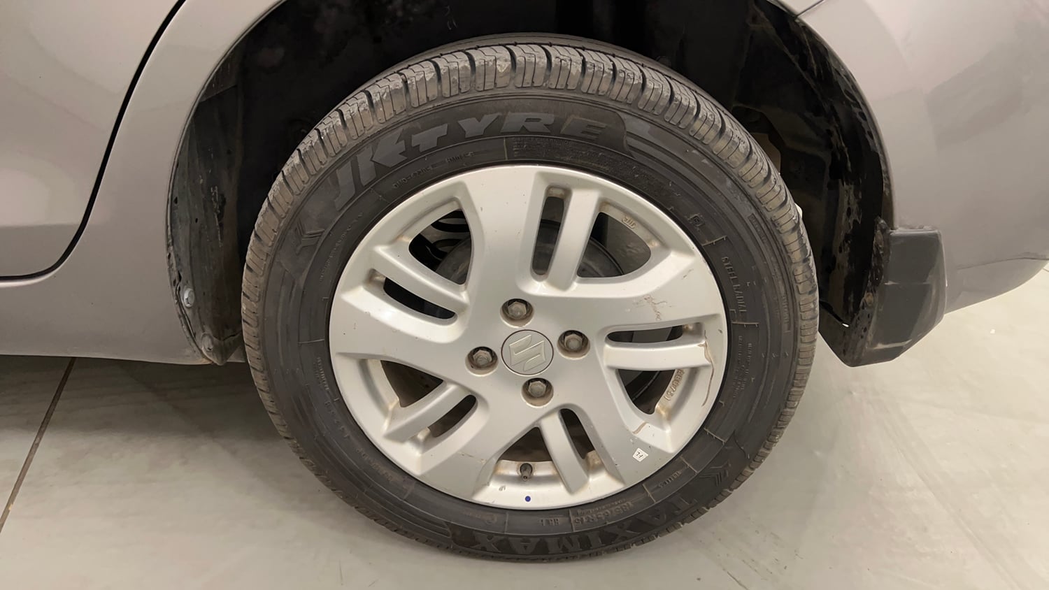 Used 2013 Maruti Suzuki Swift Dzire ZXI Petrol Manual tyres LEFT REAR TYRE RIM VIEW