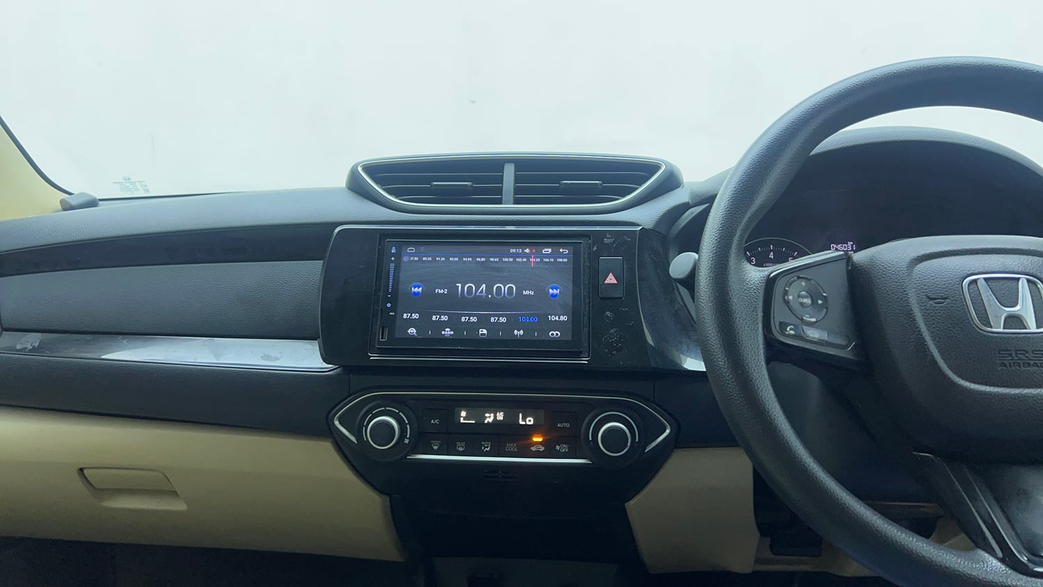 Used 2019 Honda Amaze 1.2 V CVT Petrol Petrol Automatic top_features Integrated (in-dash) music system